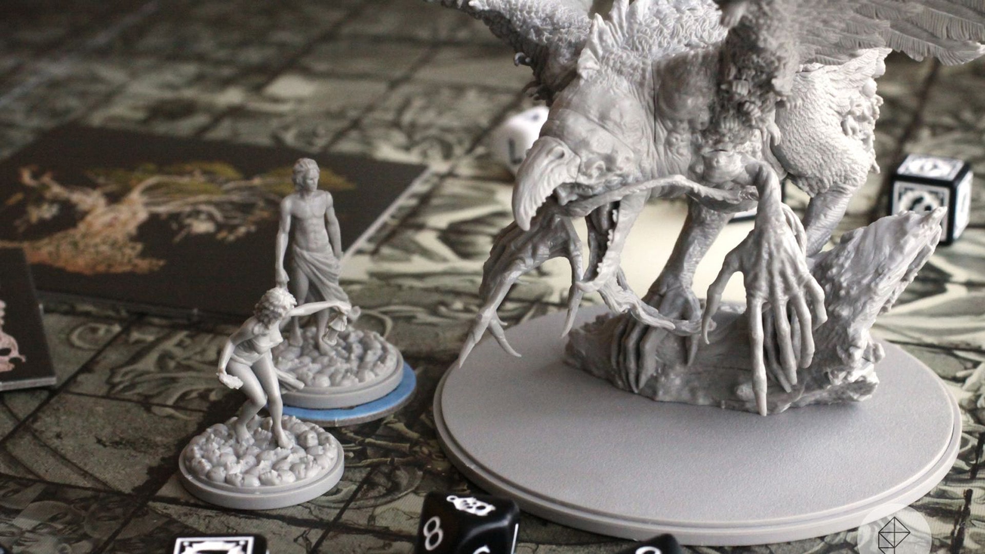 Intricately detailed miniatures and game setup of Kingdom Death: Monster, reflecting the game's complex strategy and dark fantasy theme.
