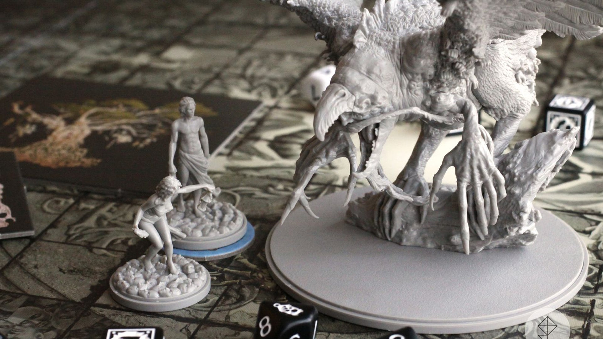 Kingdom Death: Monster Intricately detailed miniatures and game setup of Kingdom Death: Monster, reflecting the game's complex strategy and dark fantasy theme.