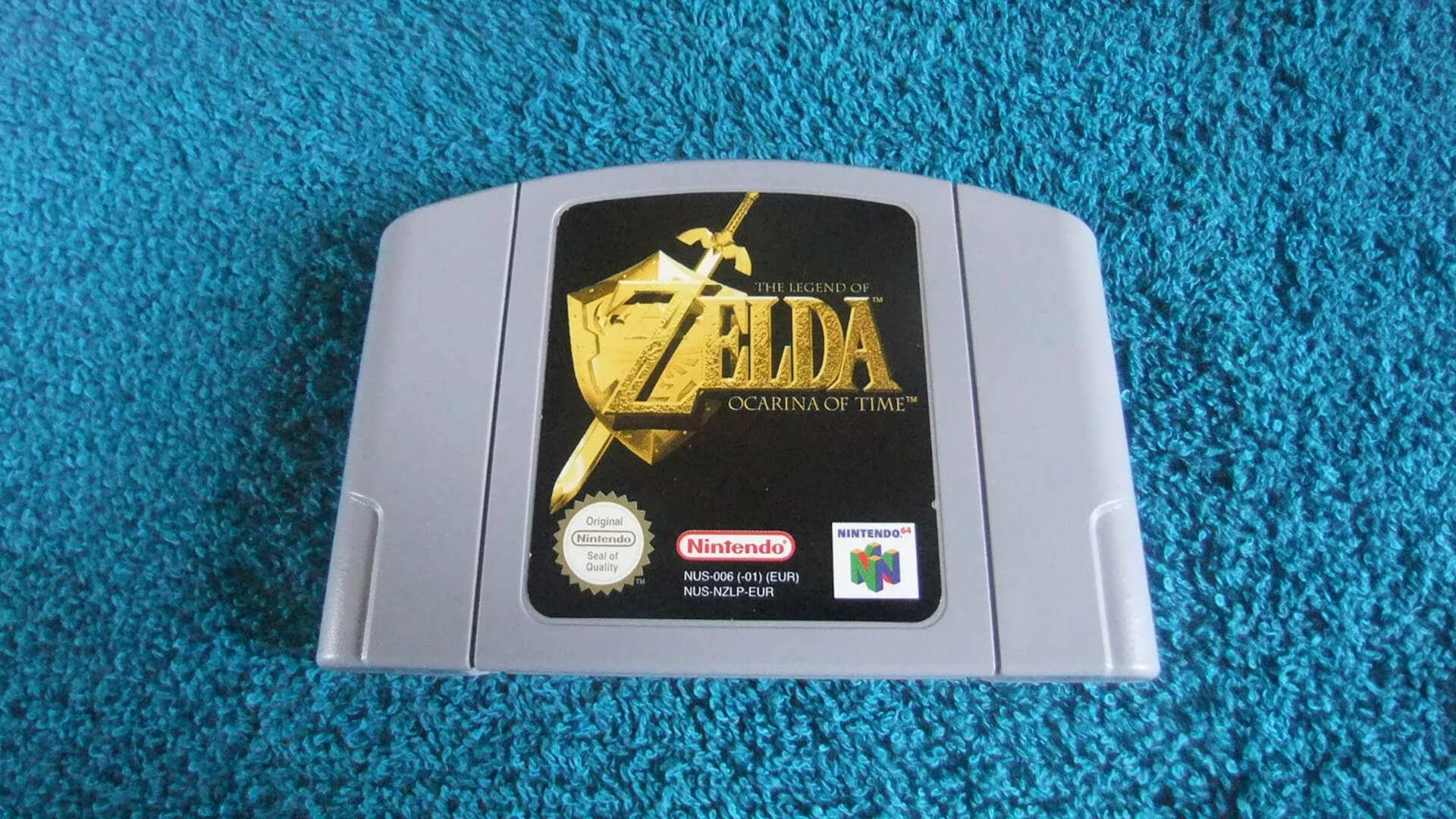The back of a standard grey Nintendo 64 game cartridge