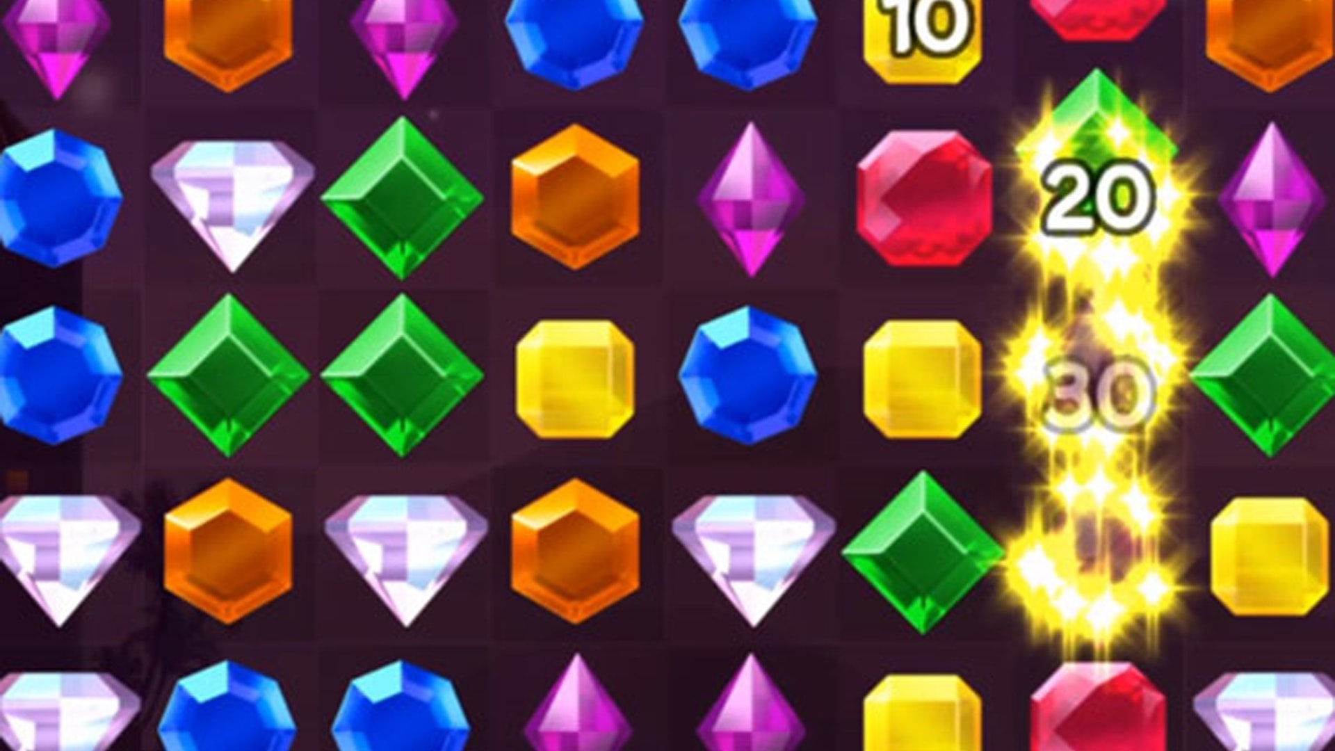 Colorful gameplay screenshot of Jewel Shuffle, showcasing vibrant jewels ready to be matched